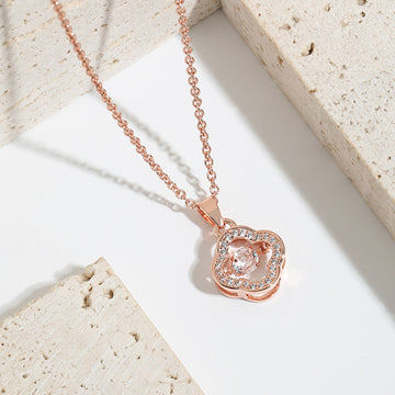 Clover necklace made of genuine 925 silver, set with zircons, and plated in rose gold.
