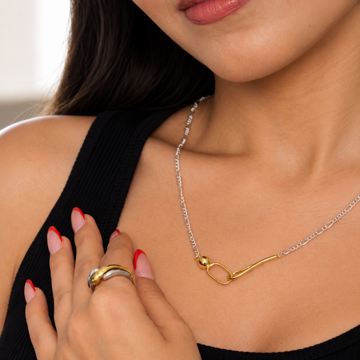 Front view of Aurelia mixed metal silver and gold sculptural necklace