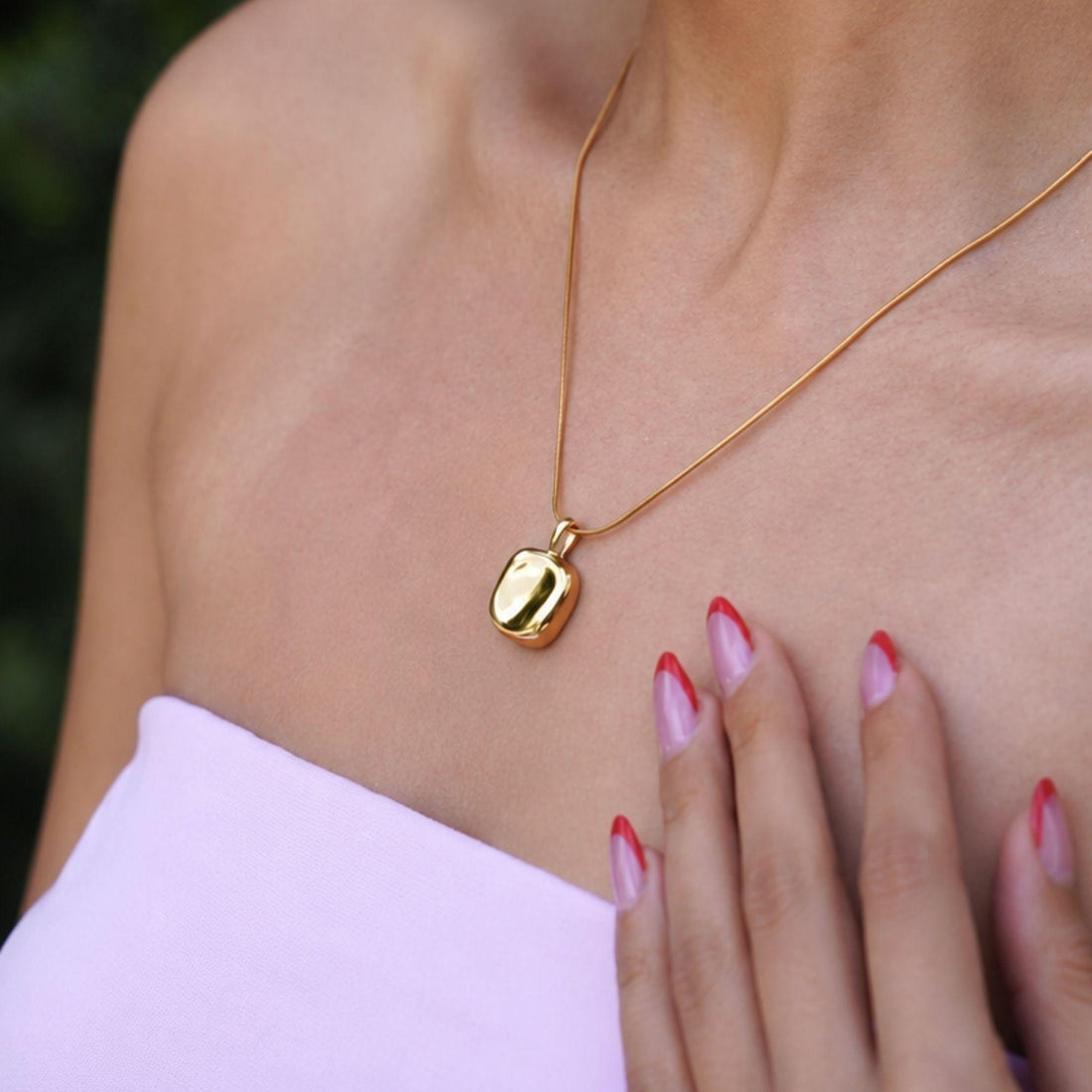 Elara gold stainless steel necklace with organic sculptural pendant