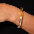 Elara gold zircon cuff bracelet worn on wrist