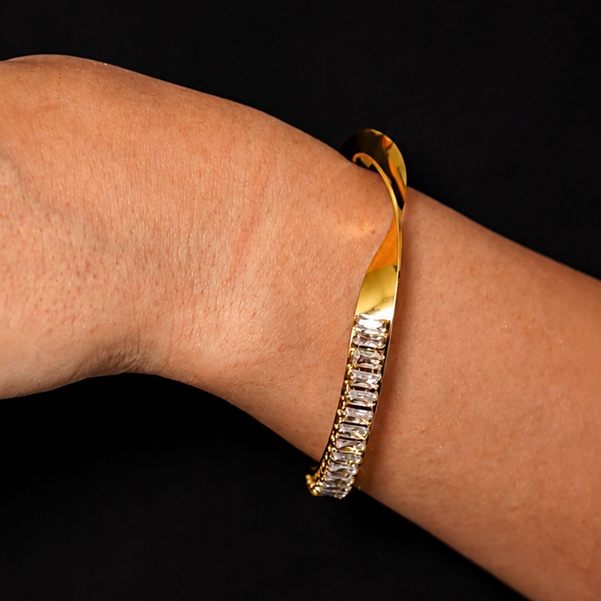 Elara gold zircon cuff bracelet worn on wrist