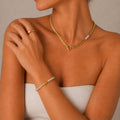 Close-up of zircon stone details on Elara gold stainless steel cuff bracelet