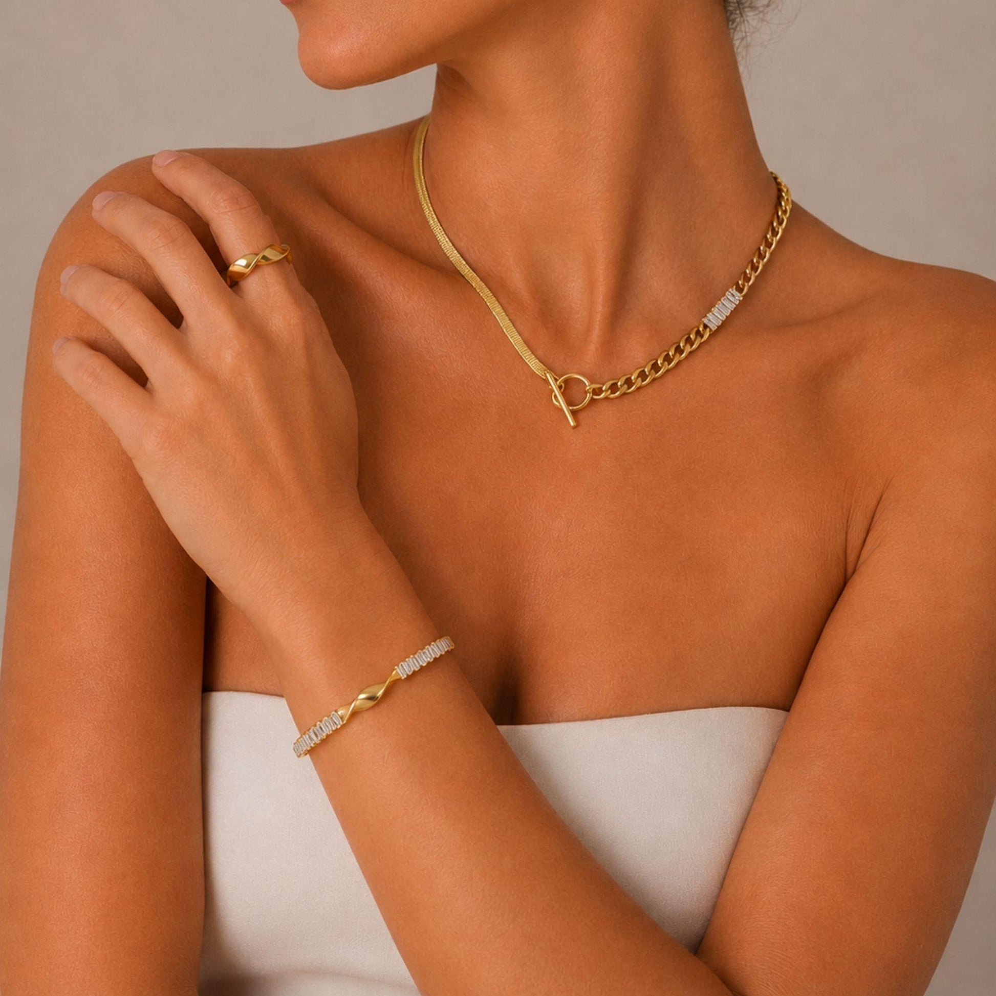 Close-up of zircon stone details on Elara gold stainless steel cuff bracelet