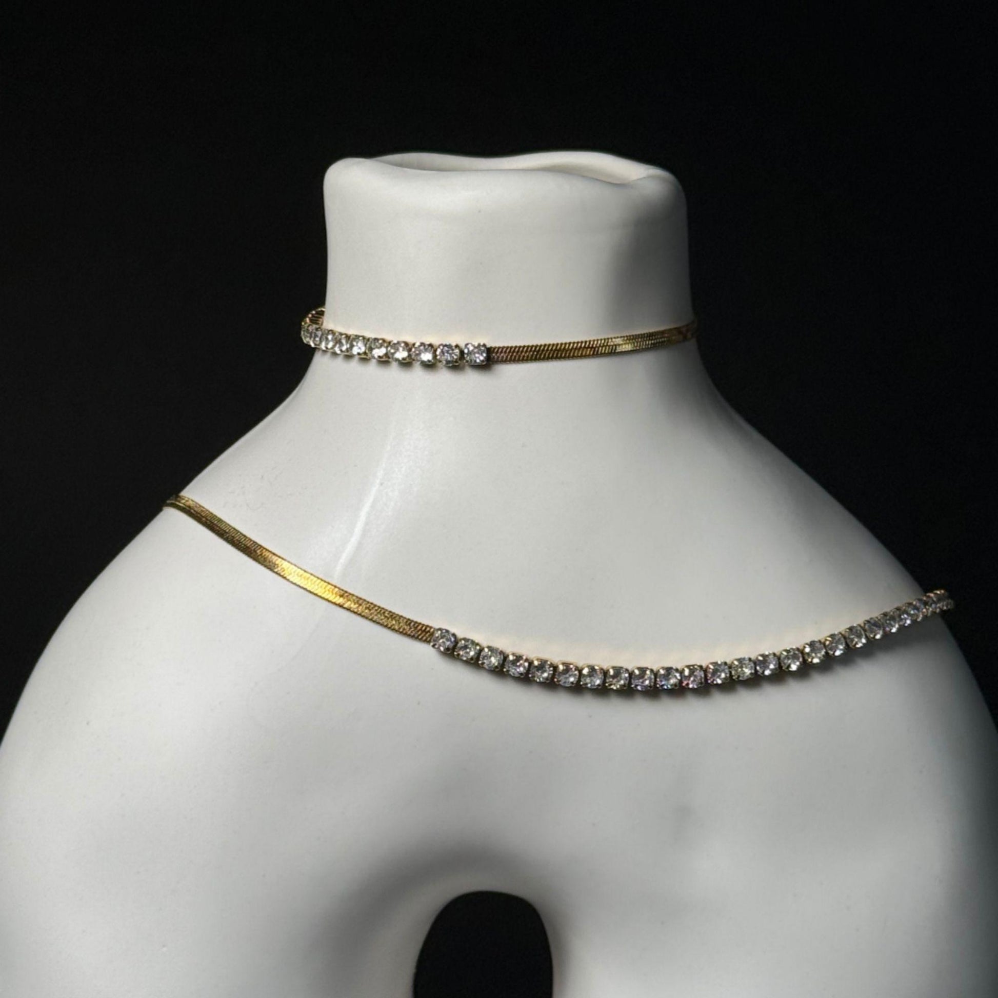 gold zircon bracelet and necklace close up