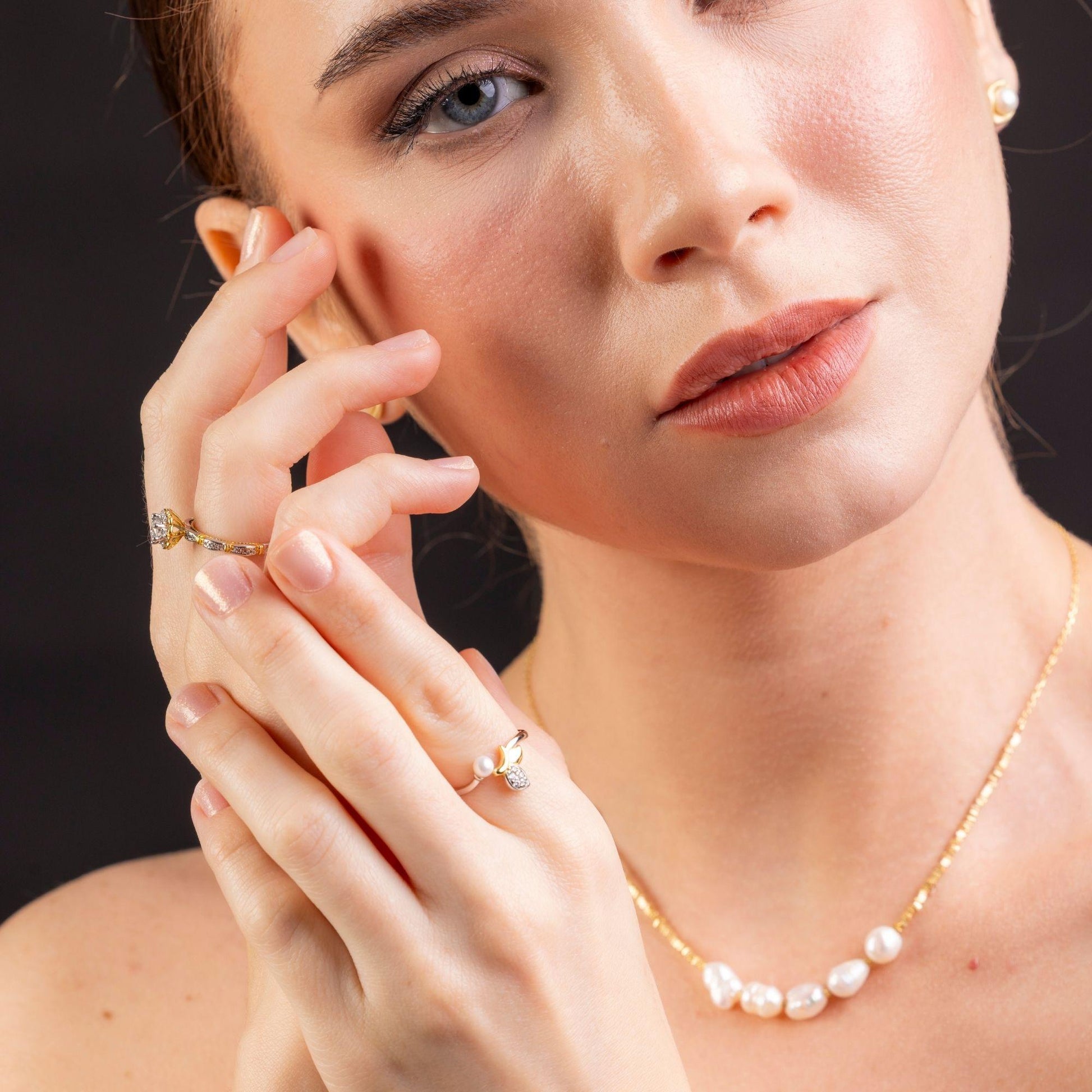 elegant halo moissanite ring on hand