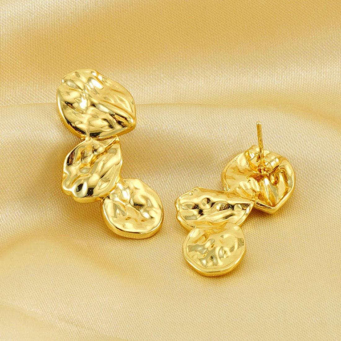 Molten Drops gold earrings in stainless steel