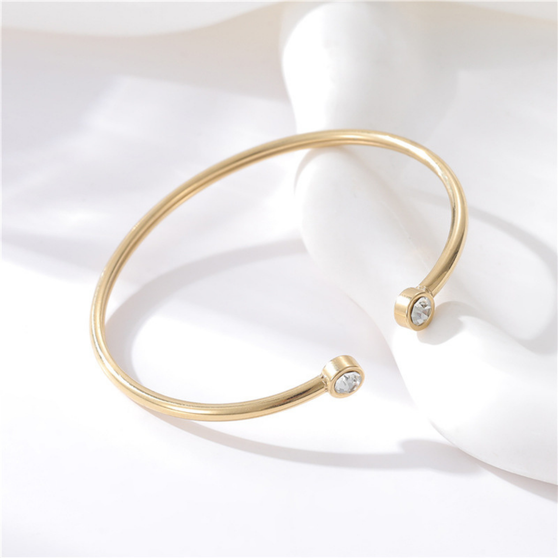 Liora gold zircon cuff bracelet worn on wrist