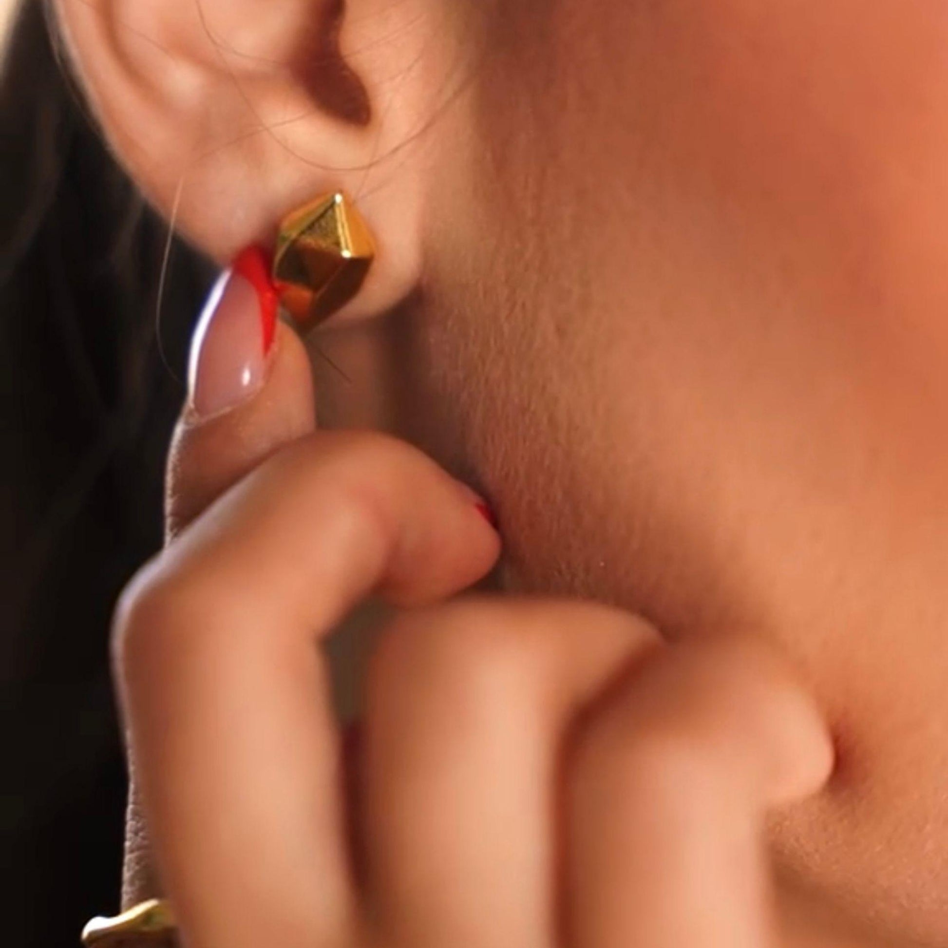 modern gold earrings with black stone
