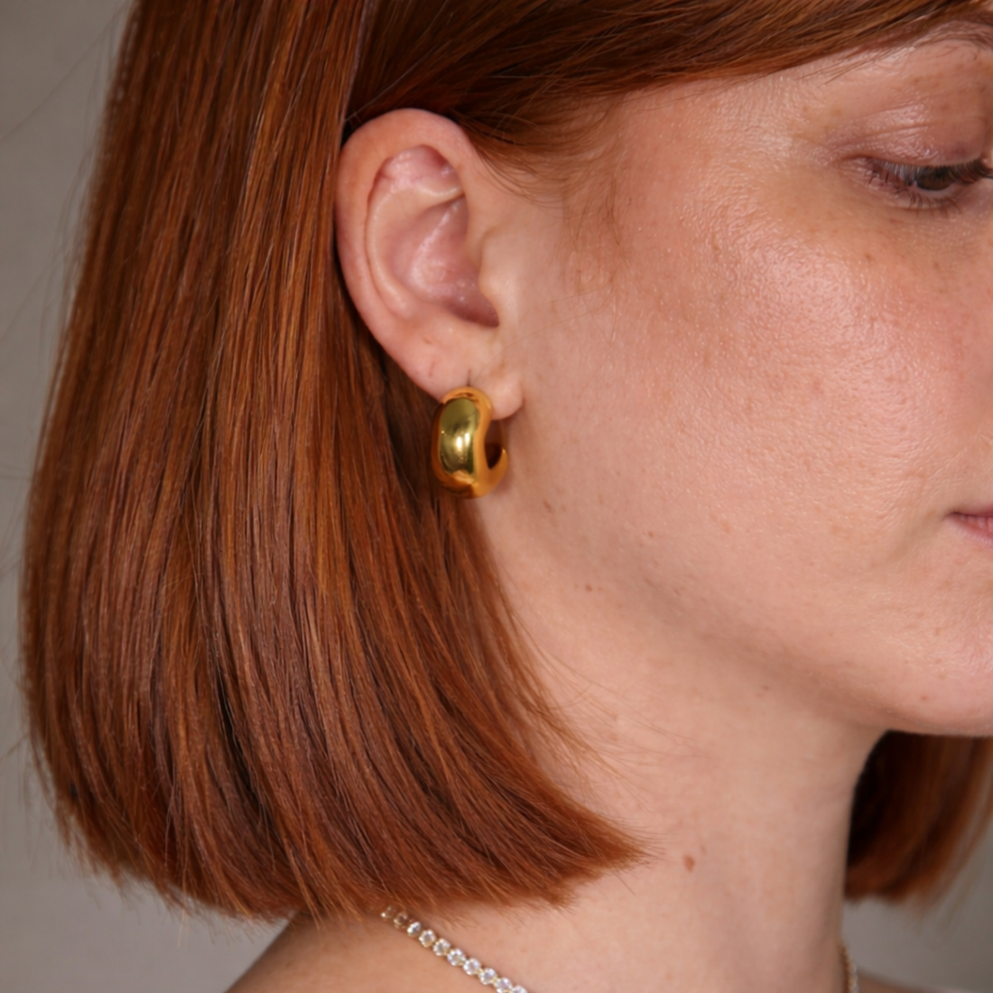 bold gold mini hoop earrings