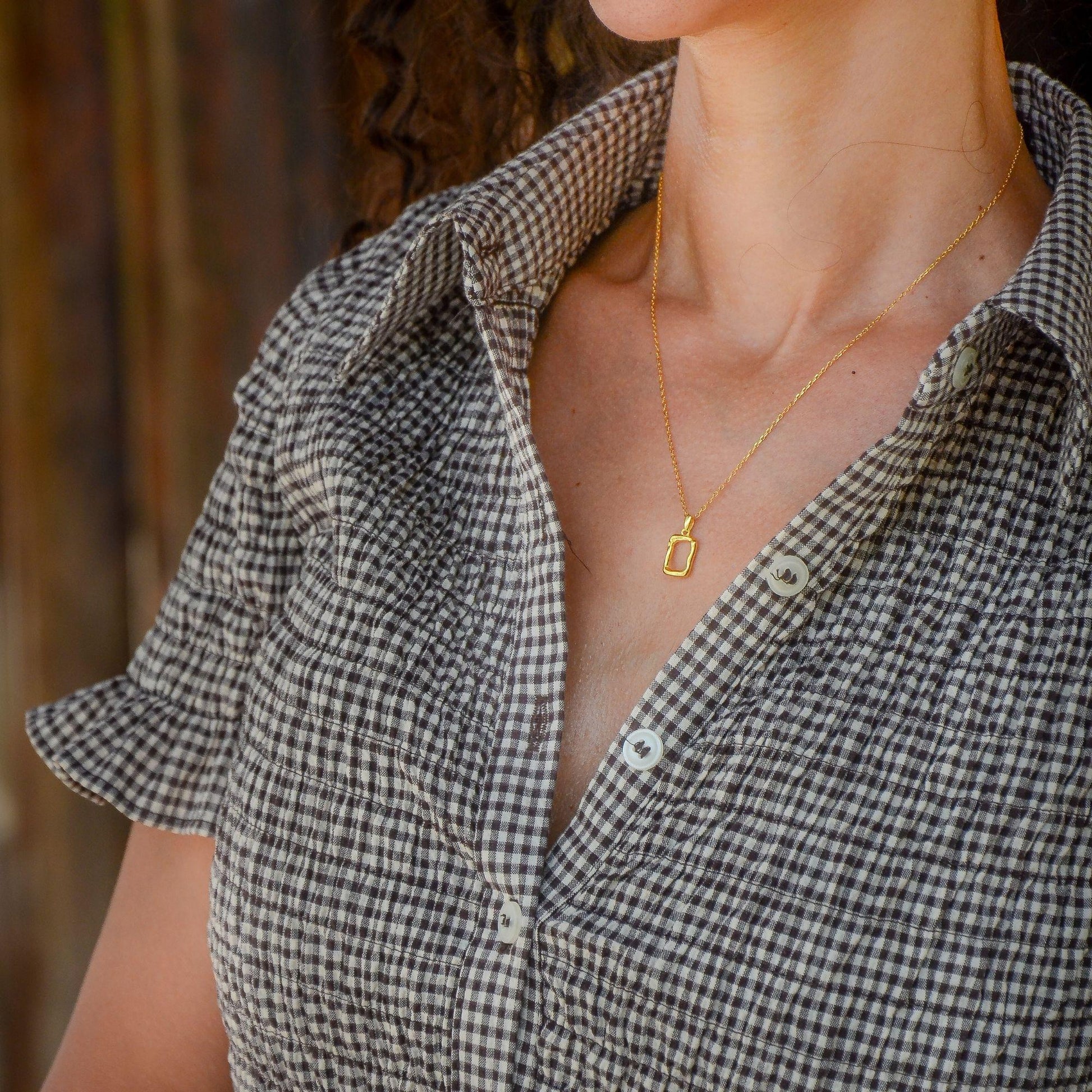 minimal gold pendant necklace organic irregular shape