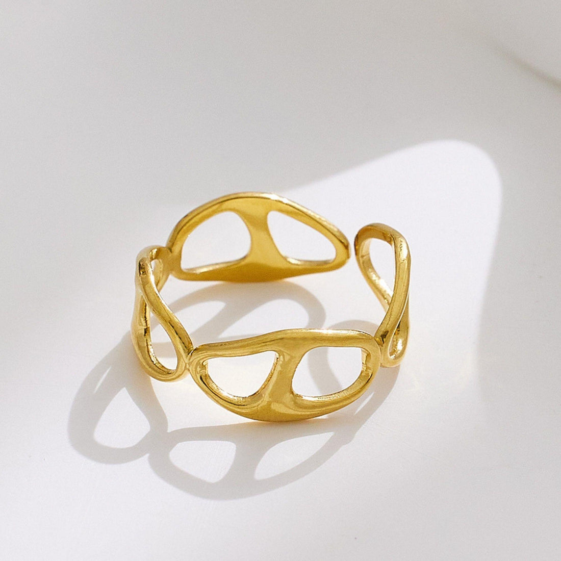 organic sculptural gold ring in stainless steel