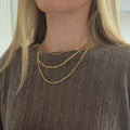 layered gold necklace styling video