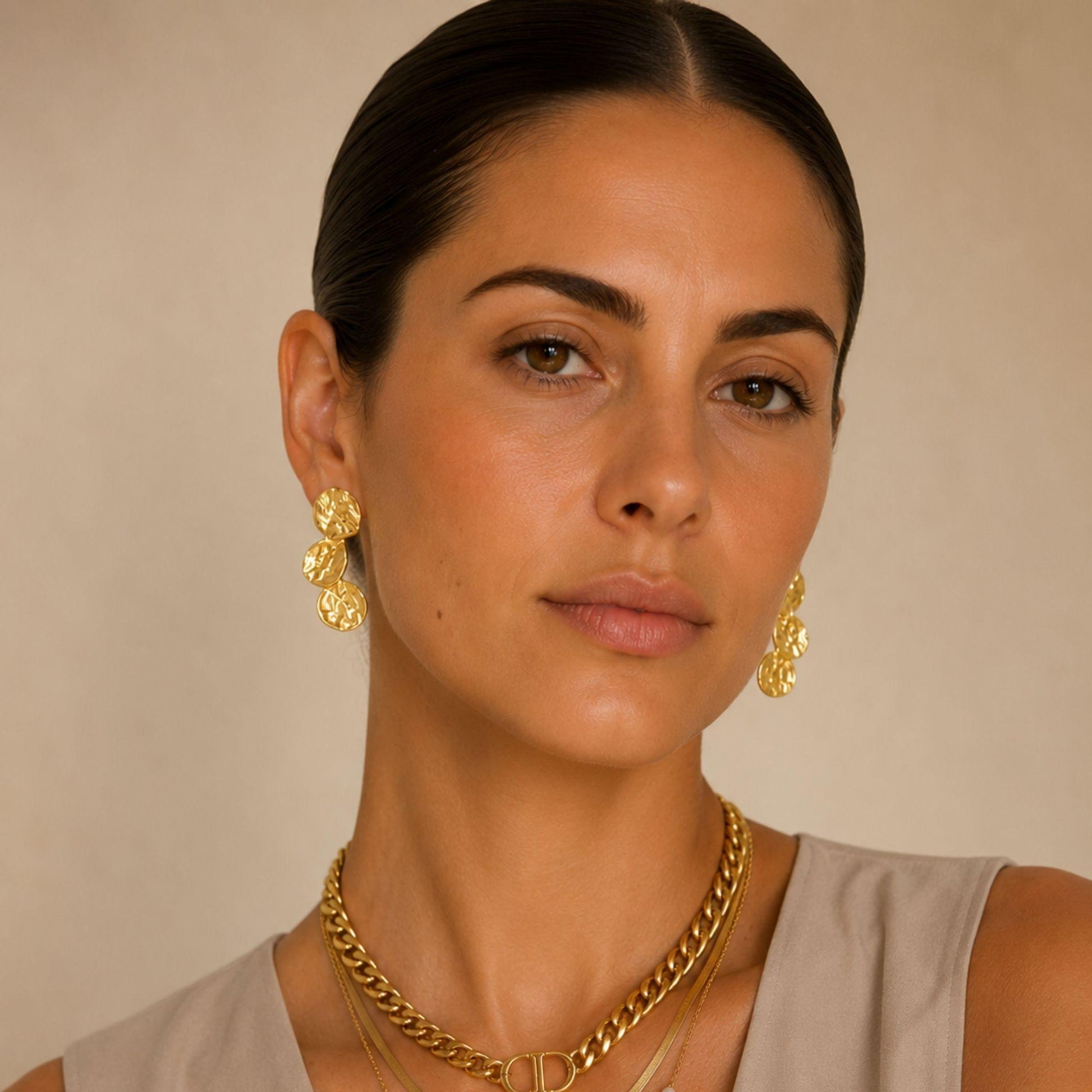 Modern gold earrings with organic design