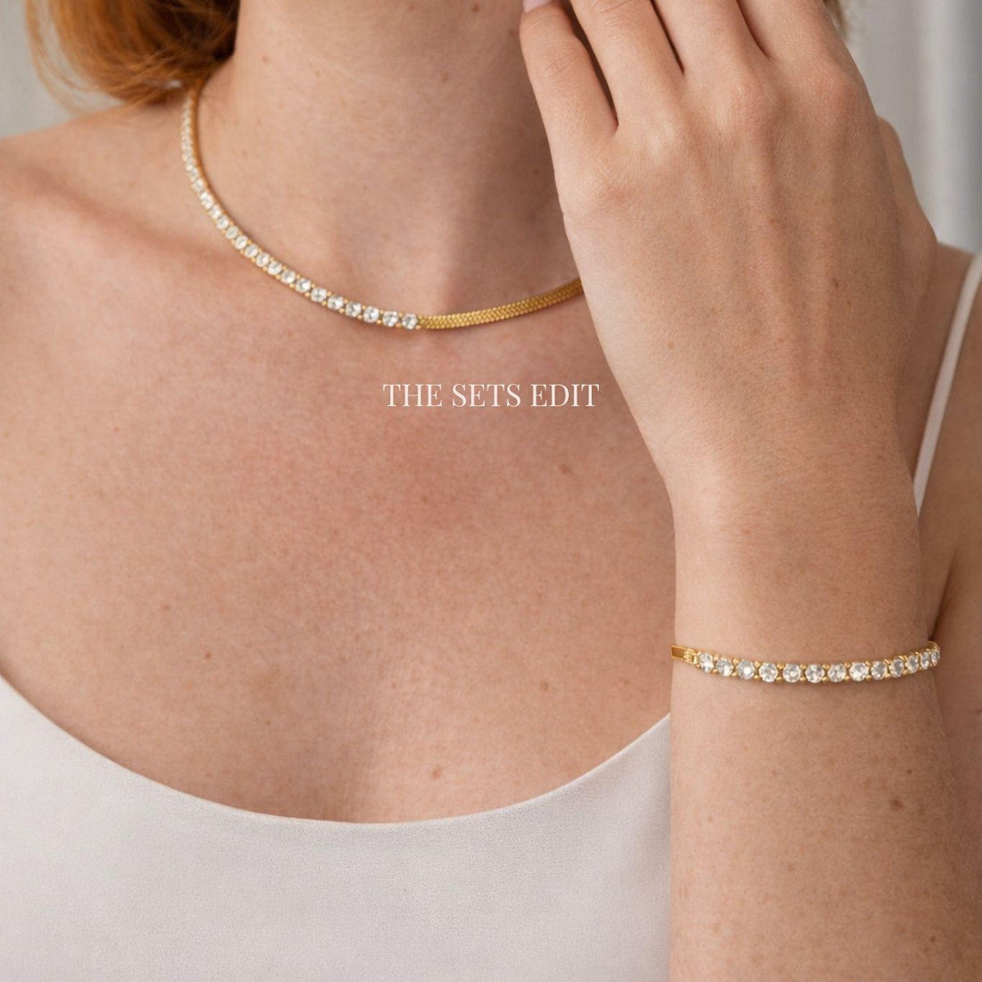 Model wearing the gold tennis necklace and bracelet set - YASMINE Everyday Luxury⁠
