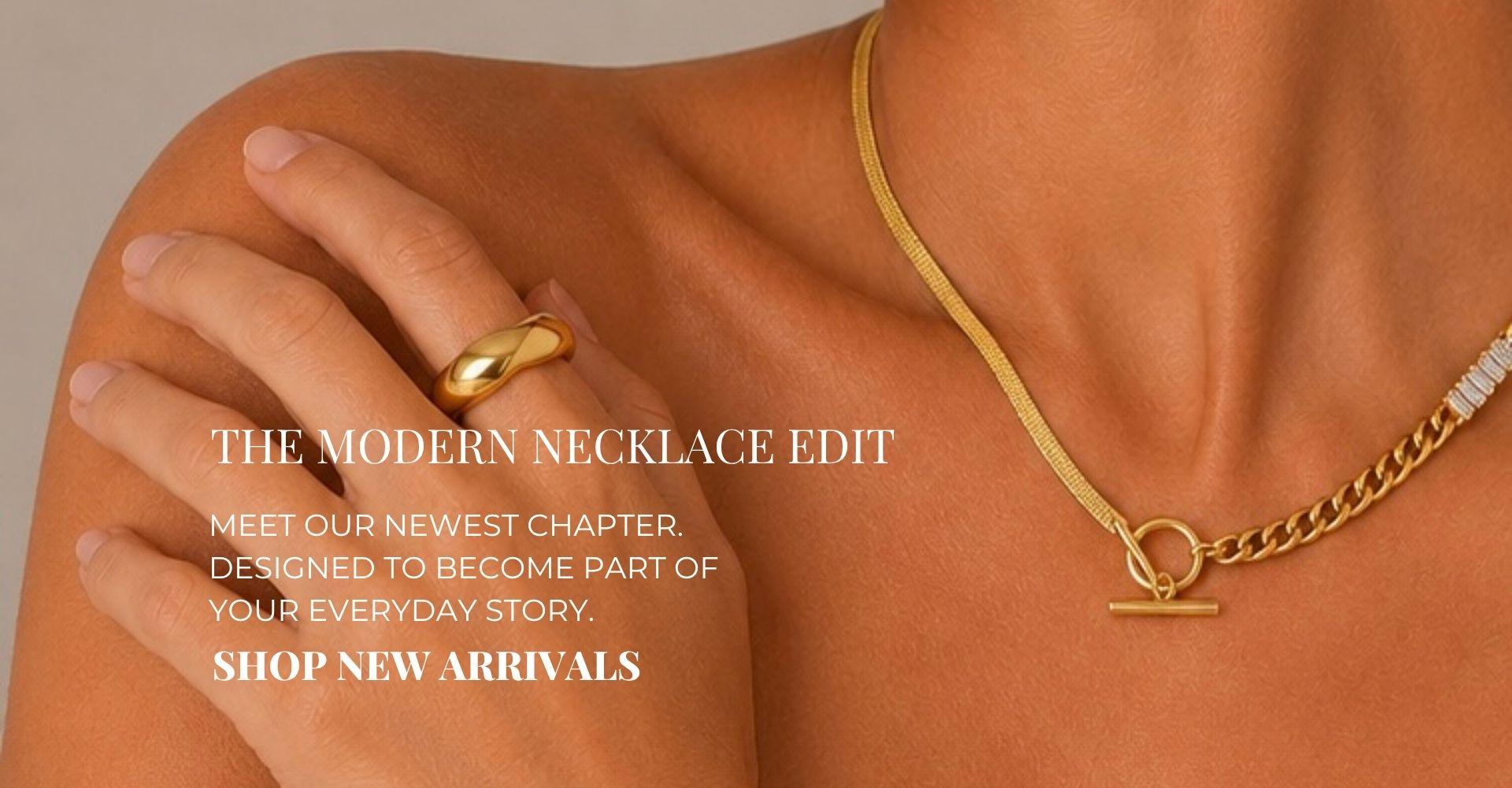 Gold toggle chain necklace and chunky gold ring styled on a model for Yasmine Jewellery Modern Necklace Edit