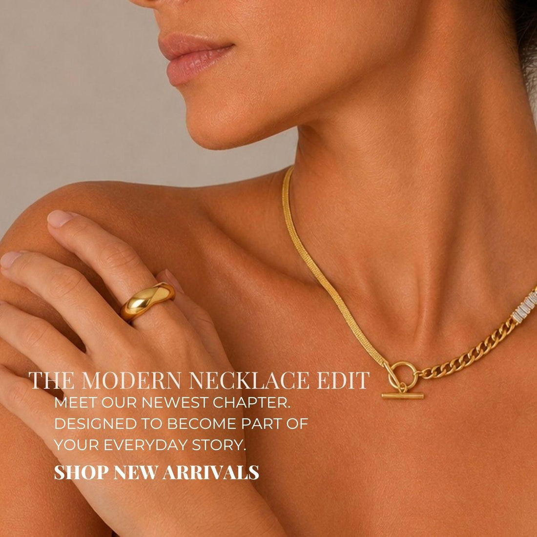 Close-up portrait of woman wearing gold toggle necklace and gold ring for Yasmine Jewellery New Arrivals